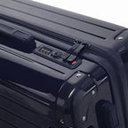 Fermeture à combinaison TSA et double curseur zippé GYL sur la valise rigide marine Intemporelle. #couleur_marine