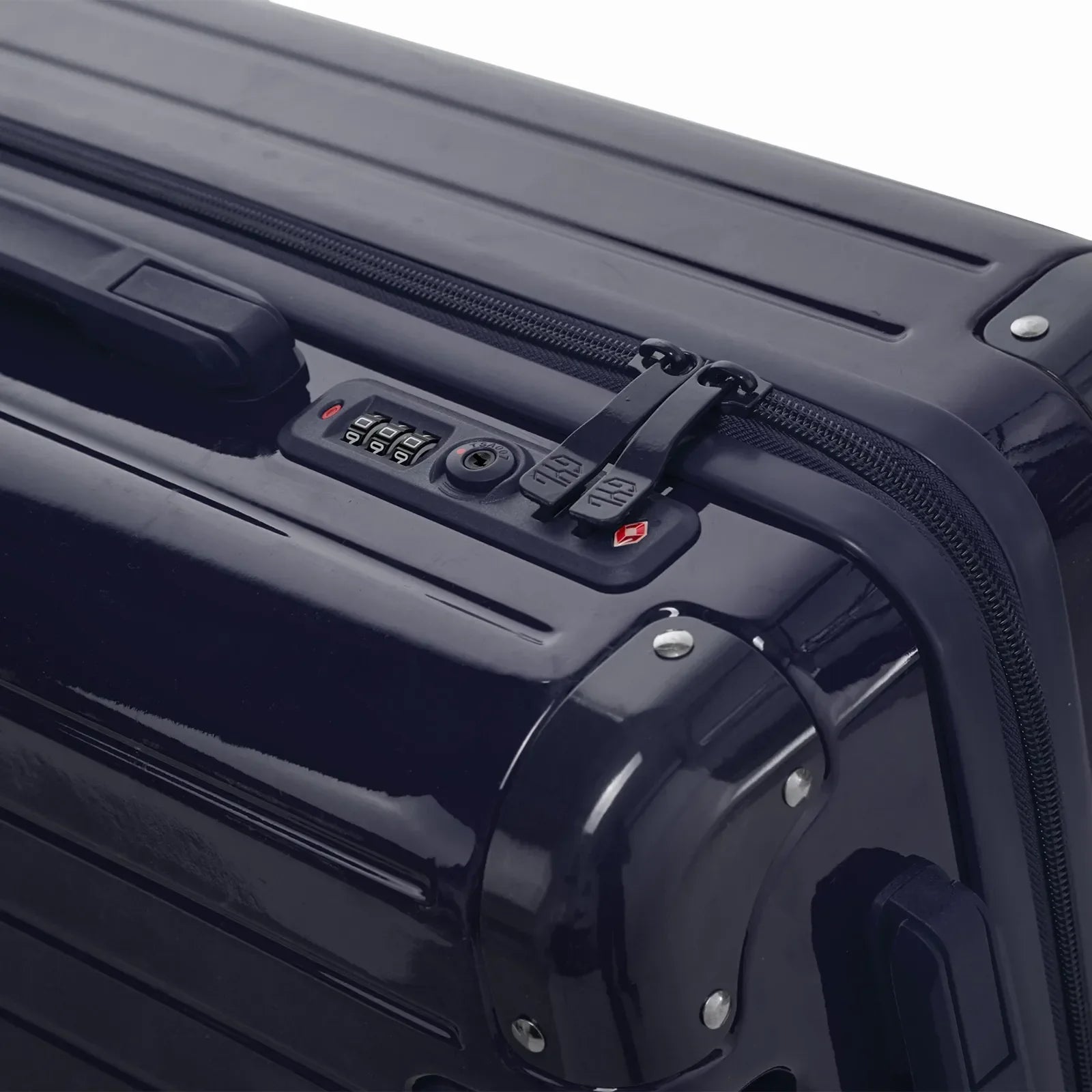 Fermeture à combinaison TSA et double curseur zippé GYL sur la valise rigide marine Intemporelle. #couleur_marine