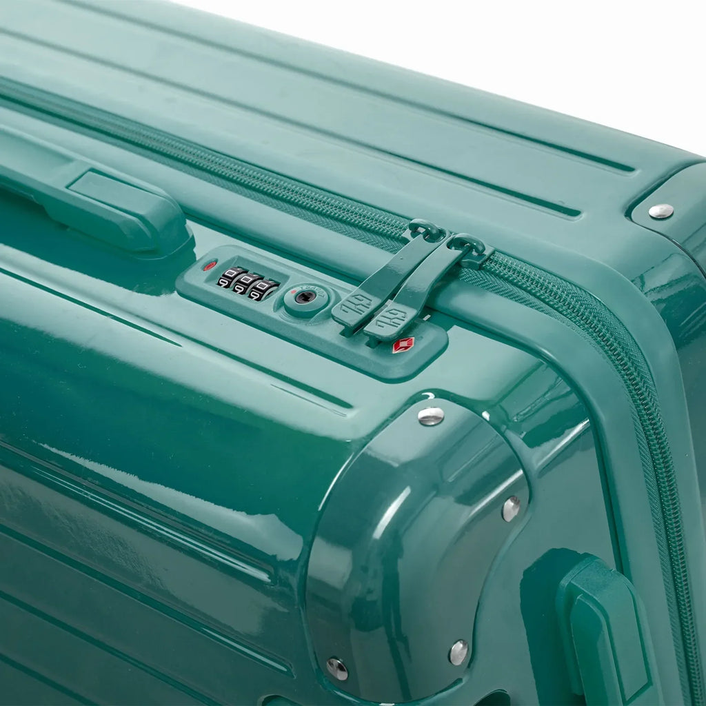 Fermeture à combinaison TSA et double curseur zippé GYL sur la valise rigide vert d'eau Intemporelle. #couleur_vert