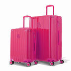Duo de valises rigides GYL Intemporelle fuchsia avec coques nervurées et poignées télescopiques. #couleur_fuchsia
