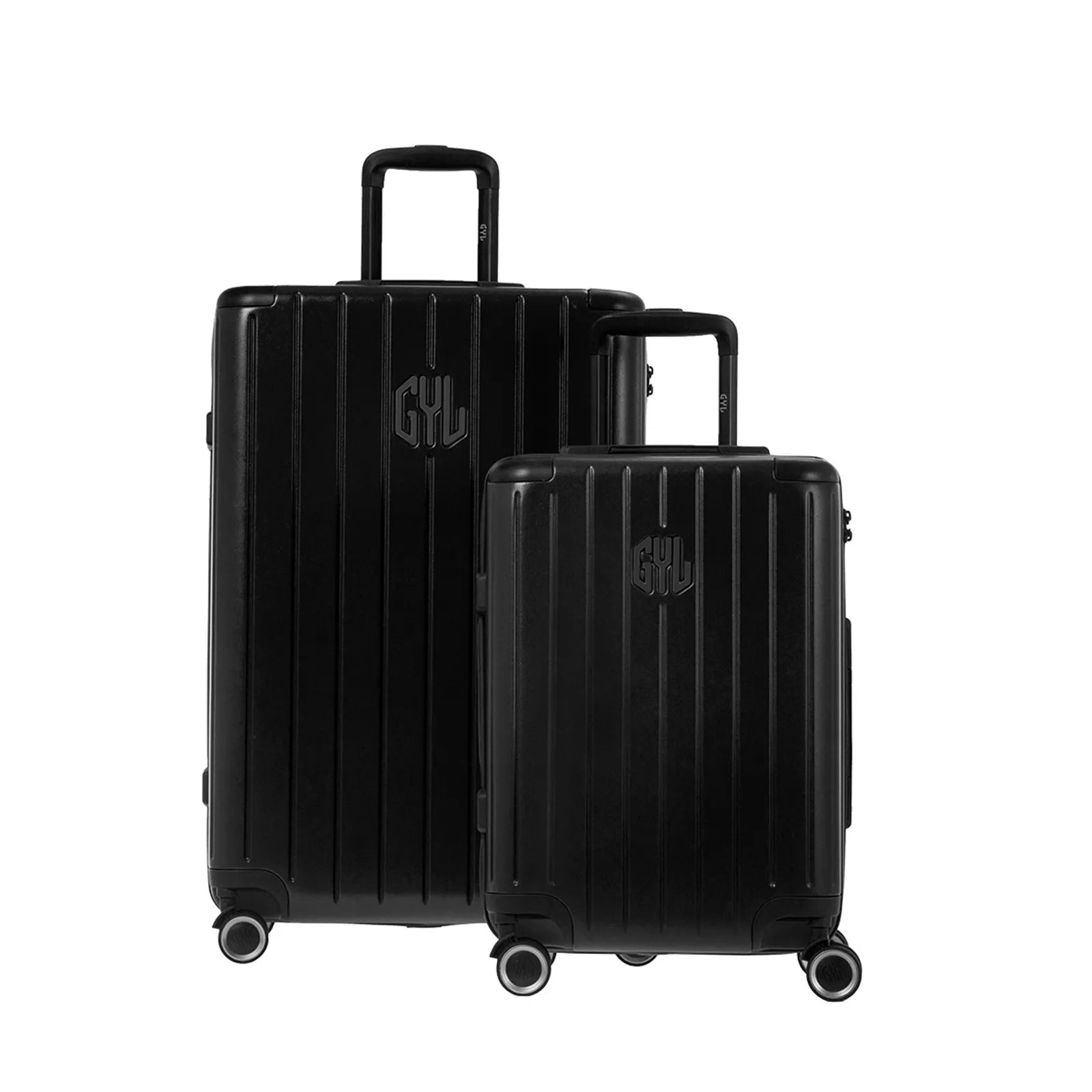 Deux valises rigides GYL Intemporelle noir, 2 formats, avec poignée trolley déployée. #couleur_noir