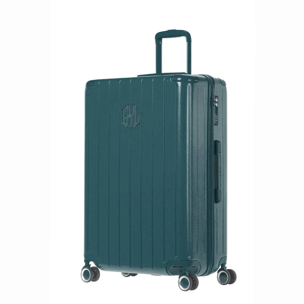 Vue face angle de la valise rigide GYL Intemporelle sapin avec poignées intégrées et roulettes pivotantes. #couleur_sapin