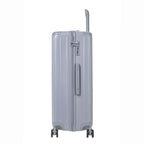 Vue latérale de la valise rigide GYL Intemporelle argent avec poignée télescopique et fermeture TSA. #couleur_argent