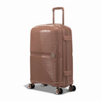 Valise GYL Signature cabine champagne en polypropylène vue de trois quarts, avec trolley déployé et roues doubles 360° #couleur_champagne