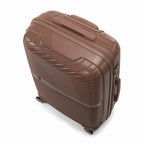 Valise cabine GYL Signature champagne vue du dessus en diagonale, montrant la poignée supérieure et la structure nervurée. #couleur_champagne