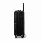 Côté de la valise moyenne GYL Signature noire avec serrure TSA intégrée et poignée latérale assortie. #couleur_noir