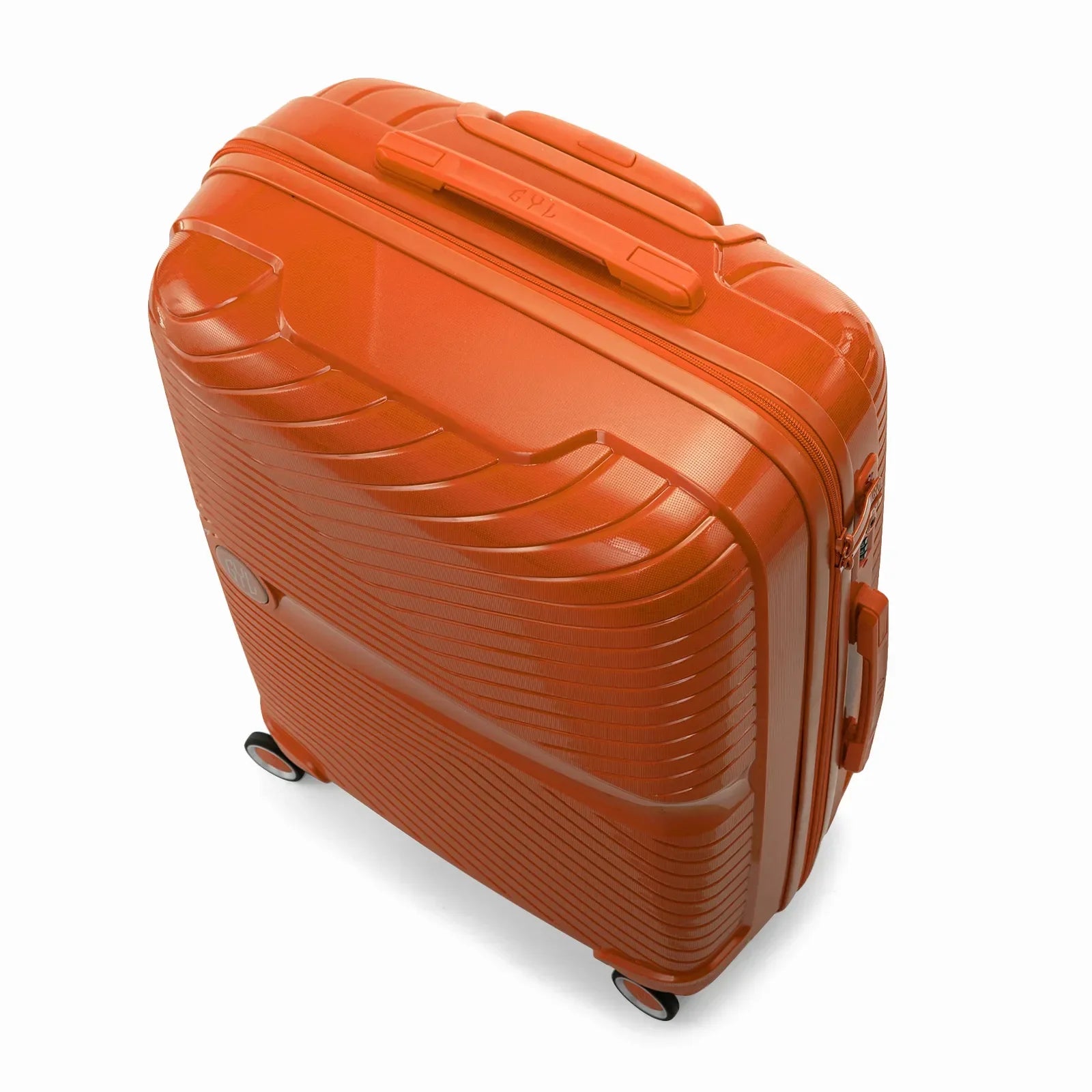Valise moyenne GYL Signature orange vue du dessus en diagonale, montrant la poignée supérieure et la structure nervurée. #couleur_orange