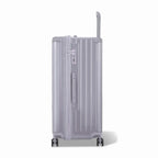 Côté de la valise trunk GYL XL argent avec serrure TSA intégrée et poignée latérale assortie. #couleur_argent