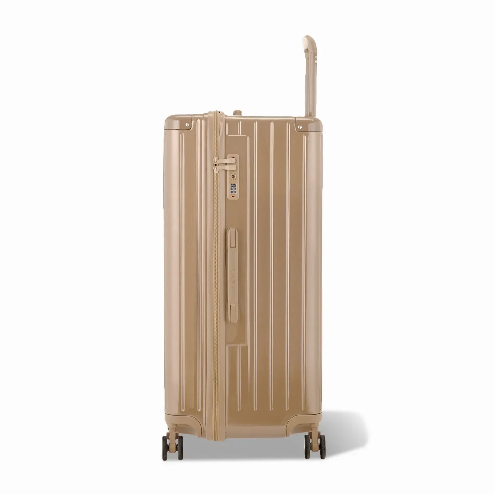 Côté de la valise trunk GYL XL champagne avec serrure TSA intégrée et poignée latérale assortie. #couleur_champagne