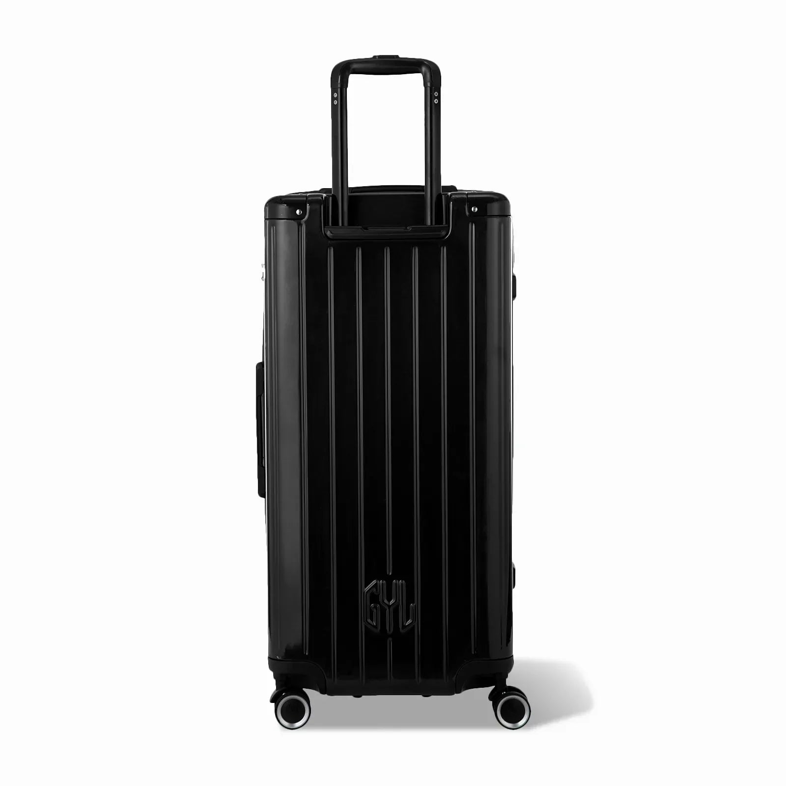 Dos de la valise trunk GYL XL noir avec trolley télescopique sorti et logo embossé. #couleur_noir