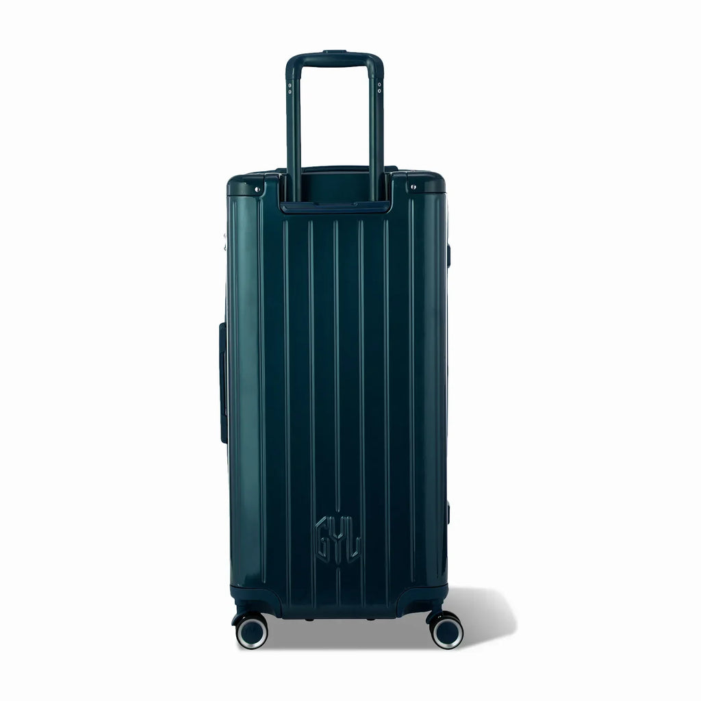 Dos de la valise trunk GYL XL sapin avec trolley télescopique sorti et logo embossé. #couleur_sapin