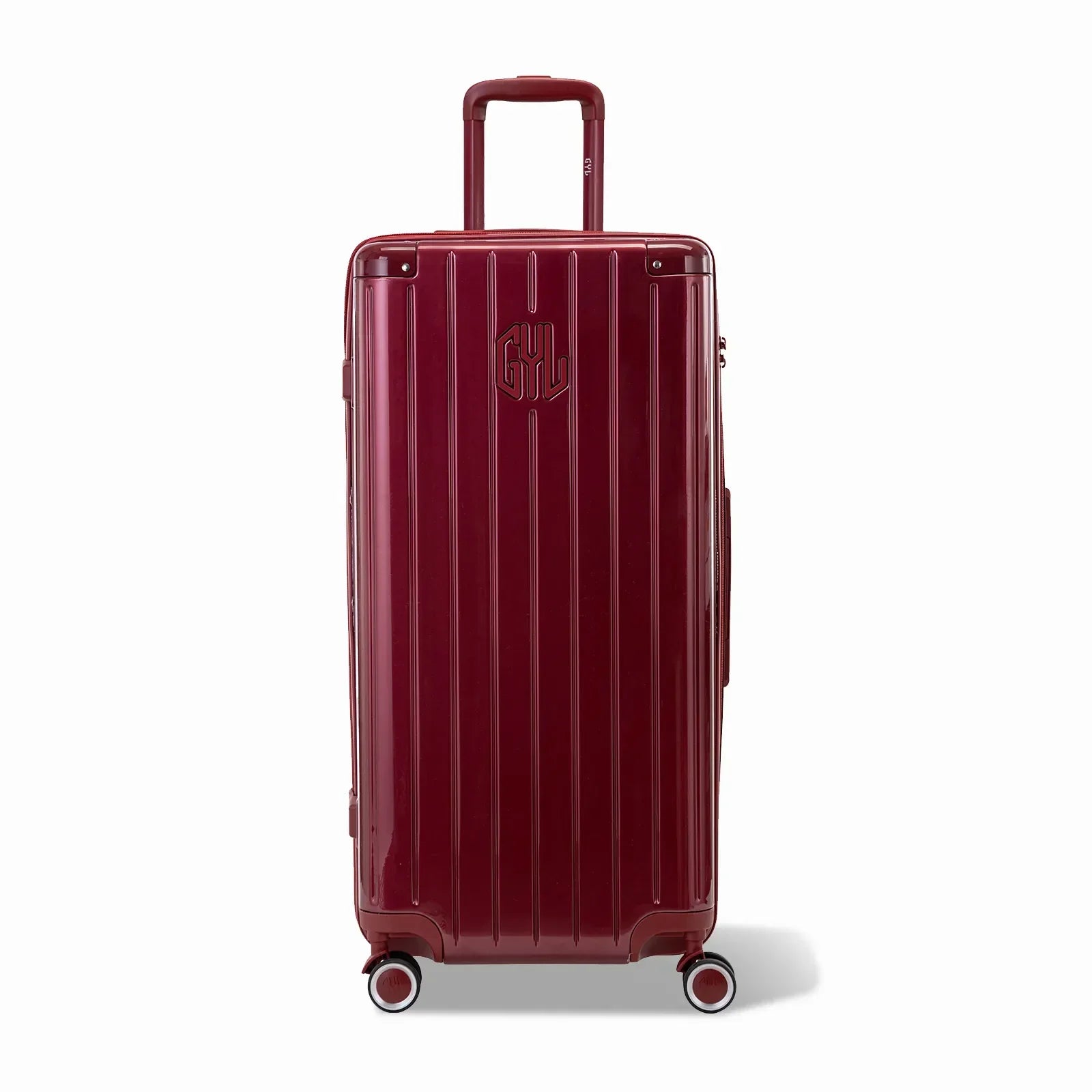 Valise trunk GYL taille XL en polycarbonate rouge foncé vue de face, avec trolley déployé et roues 360°.  #couleur_rouge foncé