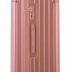 Détail de la serrure TSA et de la poignée latérale sur la valise trunk rose gold. #couleur_rose gold