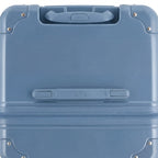 Vue du dessus de la valise trunk GYL bleu gris en polycarbonate, avec poignée centrale et coins renforcés. #couleur_bleu grisé