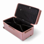 Intérieur de la valise trunk GYL XL rose gold ouvert, avec sangles croisées et compartiments de rangement. #couleur_rose gold