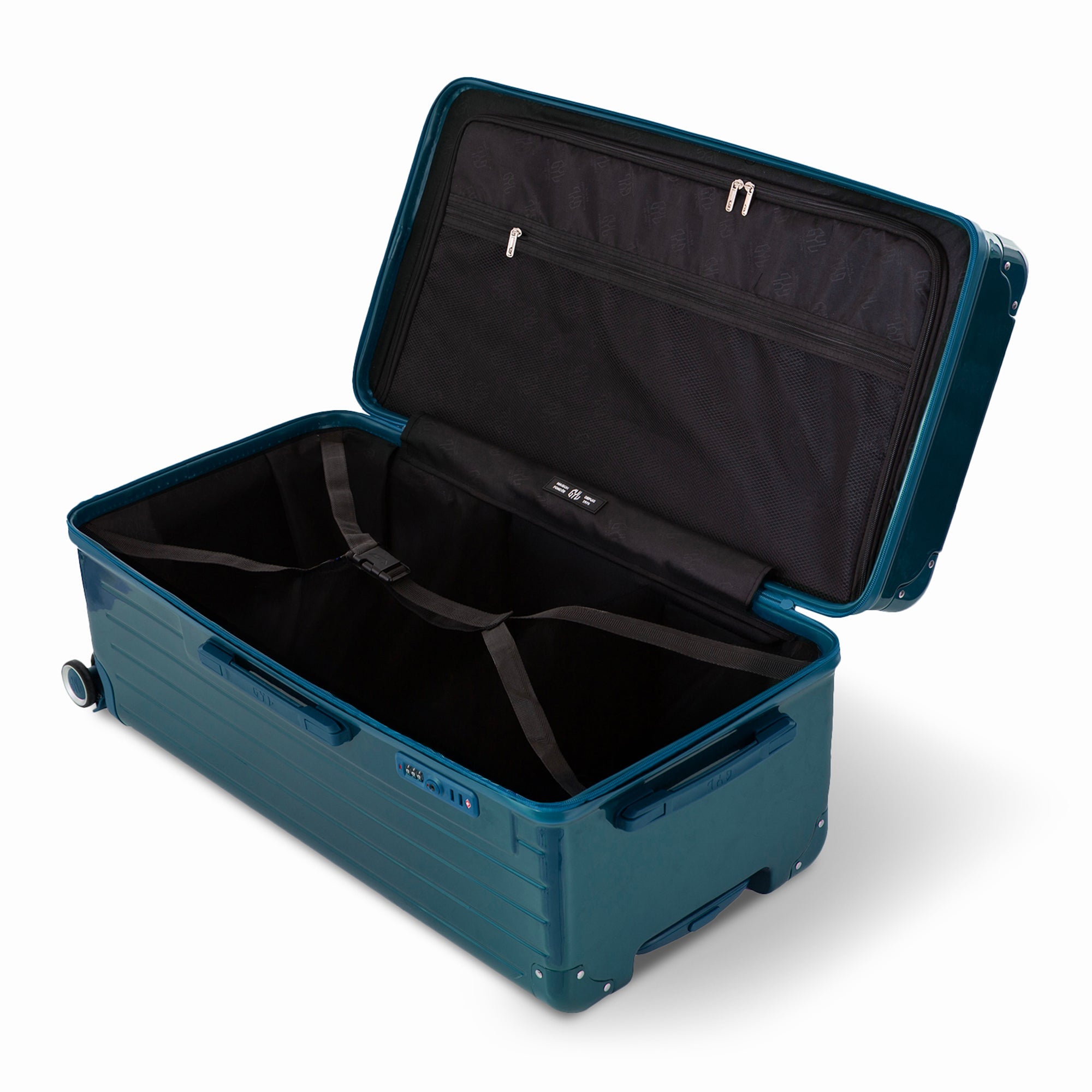 Intérieur de la valise trunk GYL XL sapin foncé ouvert, avec sangles croisées. #couleur_sapin