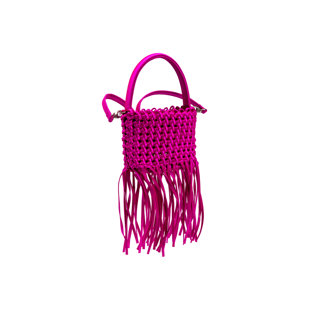 Aurnia fuschia mini tote bag with woven design and fringed detail, perfect for adding a pop of color to your outfit.