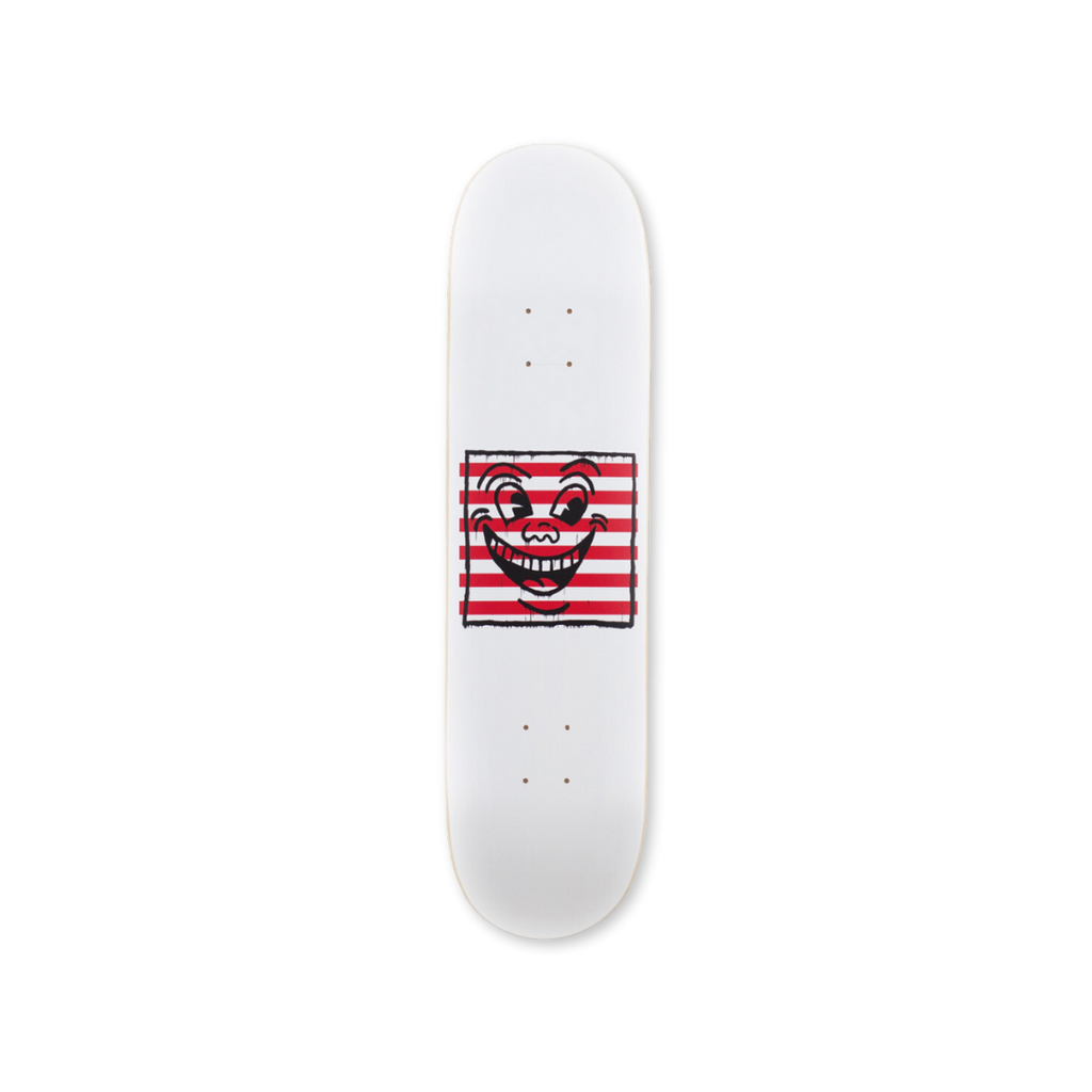 Keith Haring's Untitled (smile on stripes) skateboard art by the skateroom