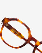 Lunettes de vue Flora Ecaille — monture ronde acétate, vue de trois-quarts