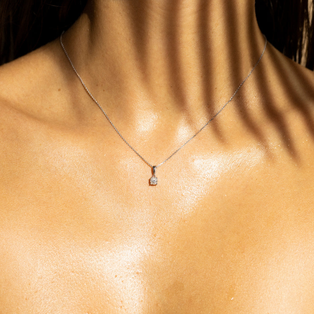 Pendentif "Brillant Luciana 0,10" Diamants: 0,06ct/1 & 0,04/9