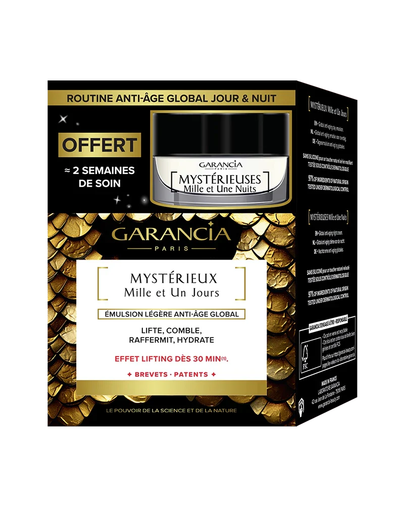 Packaging du coffret or et noir contenant le pot de crème de jour Mystérieux et une miniature de nuit offerte