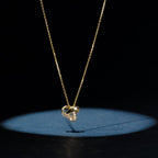 Pendentif "Noeud Elegance" D0,04Ct/8 - Or Jaune 375/1000
