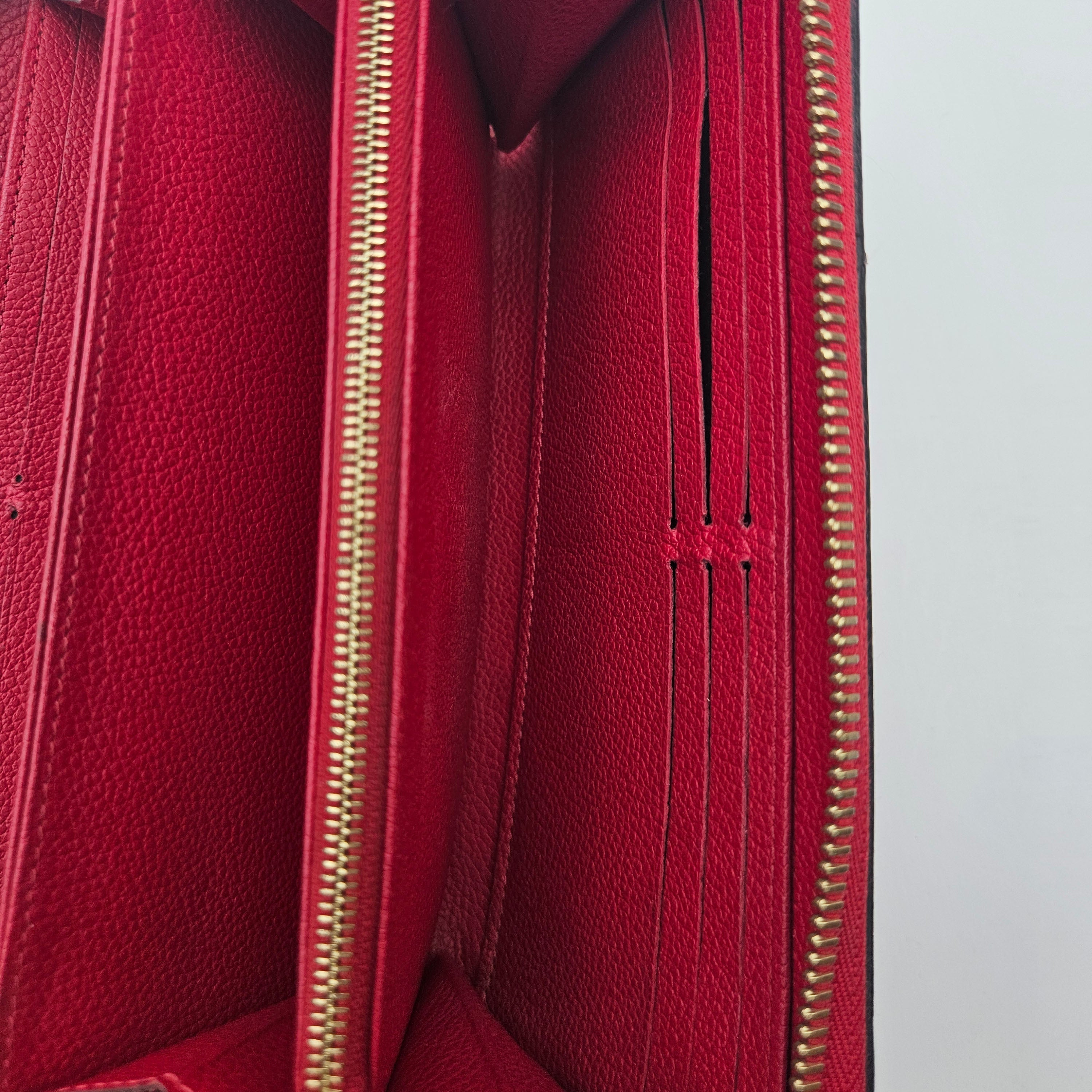 Portefeuille Louis Vuitton Zippy Continental Cuir Empreinte