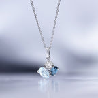 Pendentif "D'Ici & D'Ailleurs" D0,05/8, London Bt0,47/1 Et Bt 0,7/1 - Or Blanc 375/1000