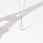 Pendentif "Infinito" Diamants 0,08/15 - Or Blanc 375/1000