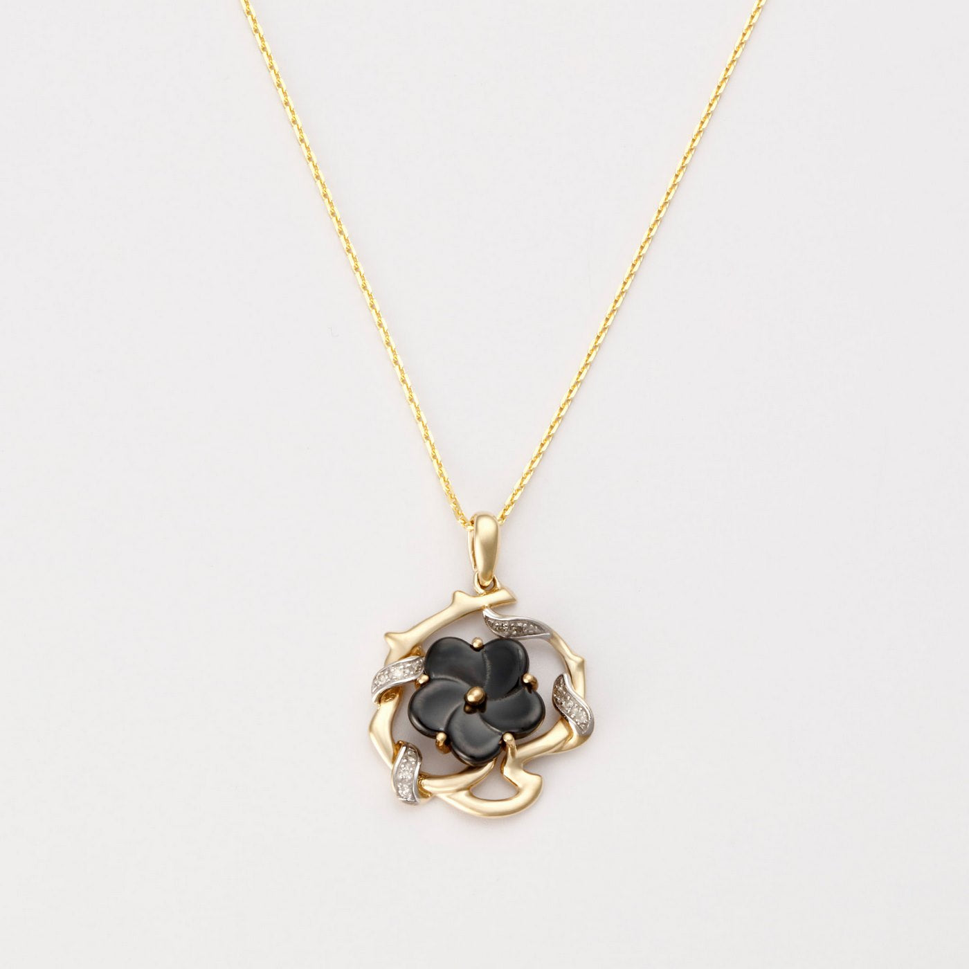 Pendentif "Fleur Torsadée" D0,039/11 - Or Jaune 375/1000