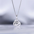 Pendentif "Trior" D0,066/12 - Or Blanc 375/1000