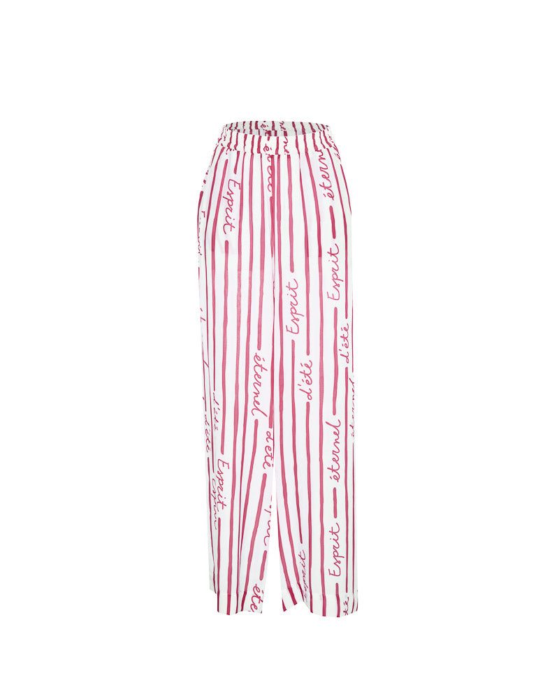 Pantalon June Rouge Framboise – Tatiane de Freitas – pantalon de plage avec une taille haute, jambes larges fluides, matière légère, poches, imprimé "Esprit d'été éternel", beachwear luxe femme Lyon