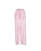 Pantalon June Rouge Framboise – Tatiane de Freitas – pantalon de plage avec une taille haute, jambes larges fluides, matière légère, poches, imprimé "Esprit d'été éternel", beachwear luxe femme Lyon