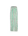 Pantalon June Vert Palmier – Tatiane de Freitas – pantalon de plage à taille haute,  jambes larges fluides, matière légère, poches, imprimé "Esprit d'été éternel", beachwear chic femme Lyon