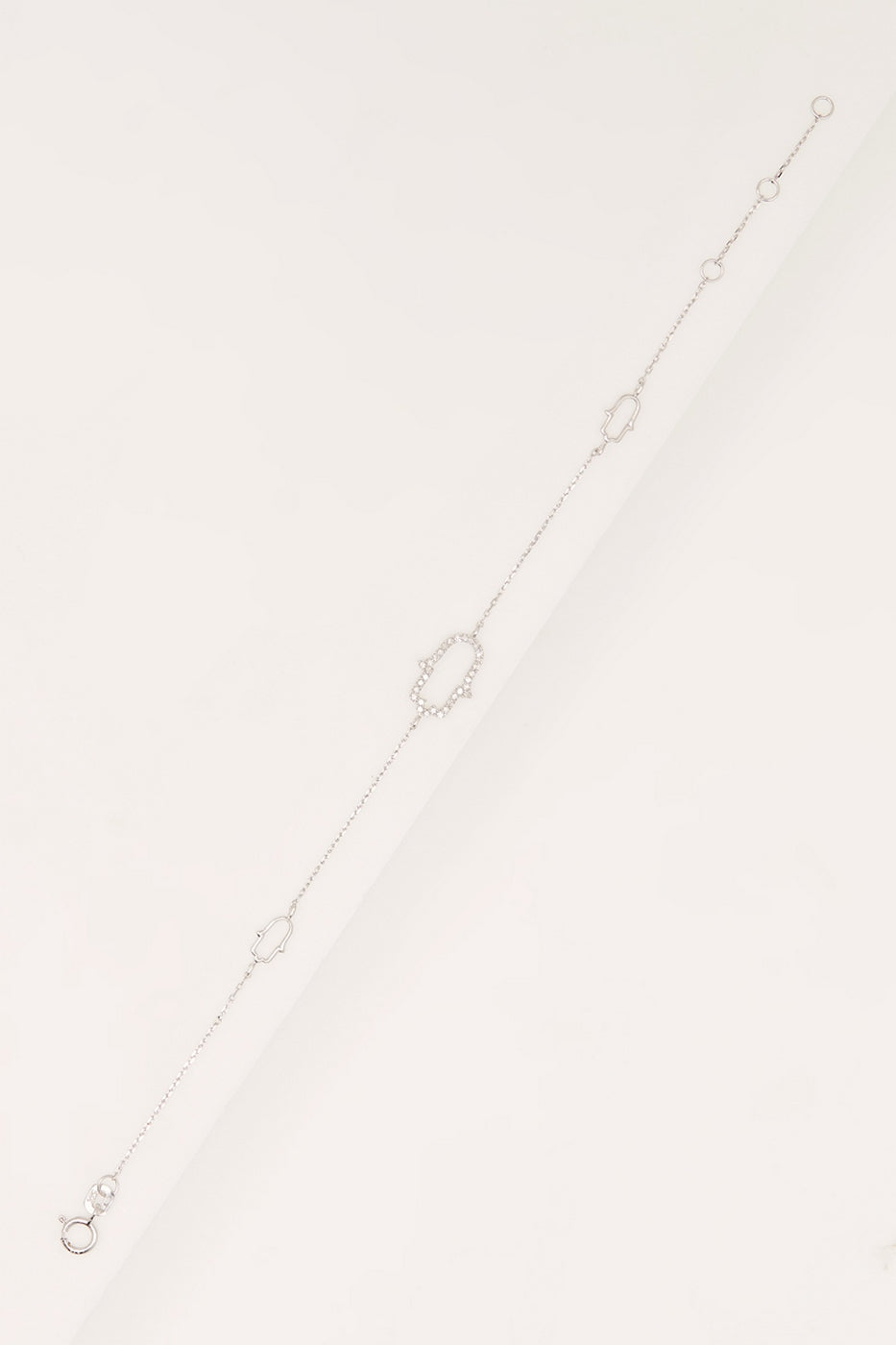 Bracelet "Main" D0,10/33 - Or Blanc 375/1000