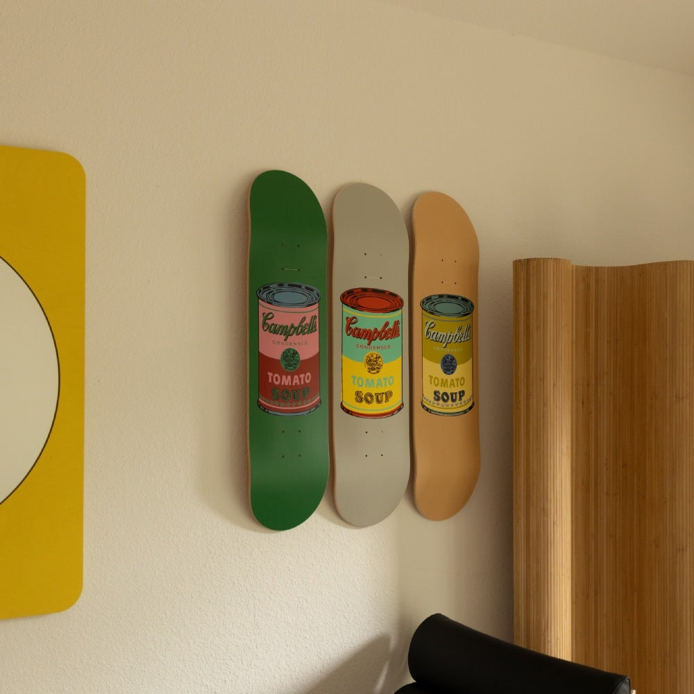 Three of the Andy warhol set of eight coloured Campbell's soup cans collection by THE SKATEROOM