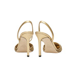 Adia Gold High-Heel Slingback Pump showcasing a stylish back view, featuring elegant metallic leather details.