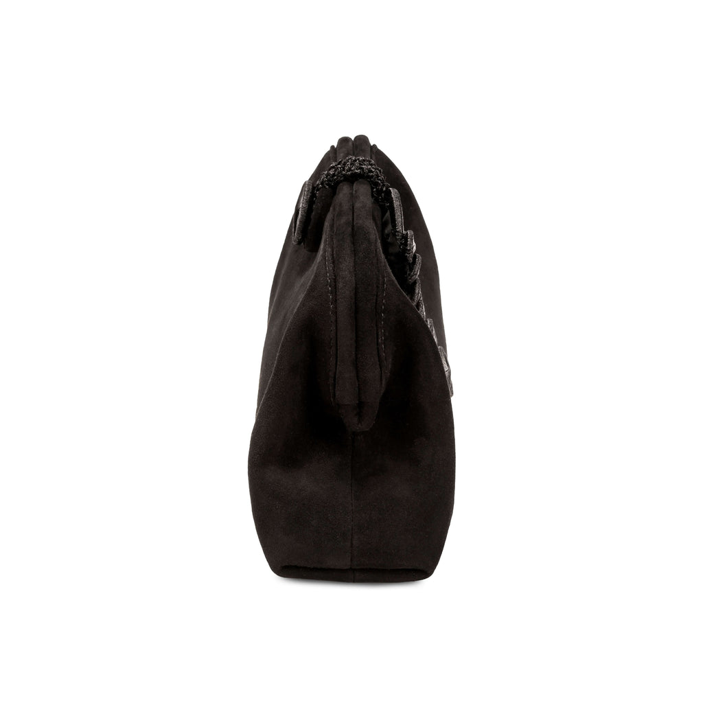 Alessa Black Pouch Bag showcasing its unique knotted design and luxurious leather material.