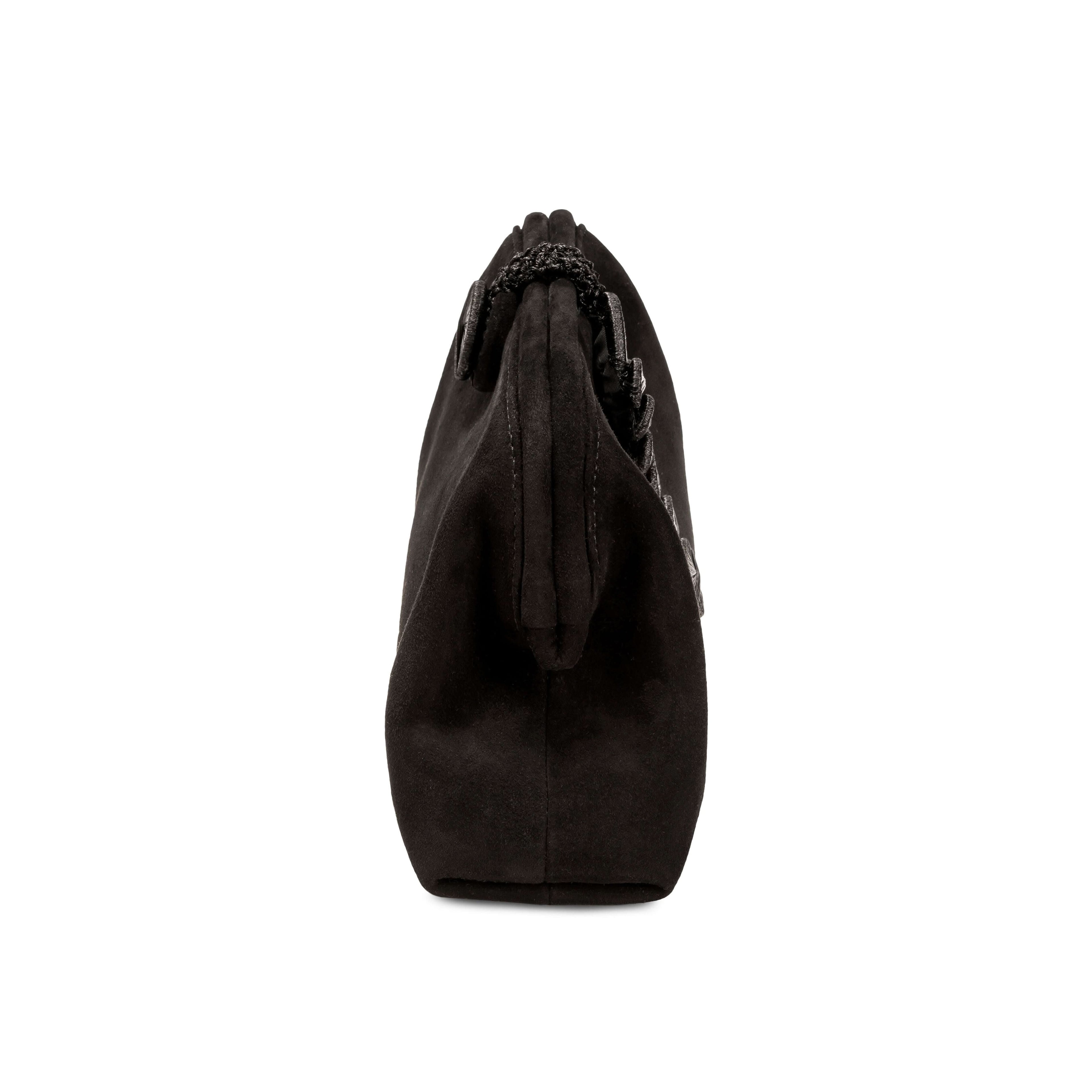 Alessa Black Pouch Bag showcasing its unique knotted design and luxurious leather material.