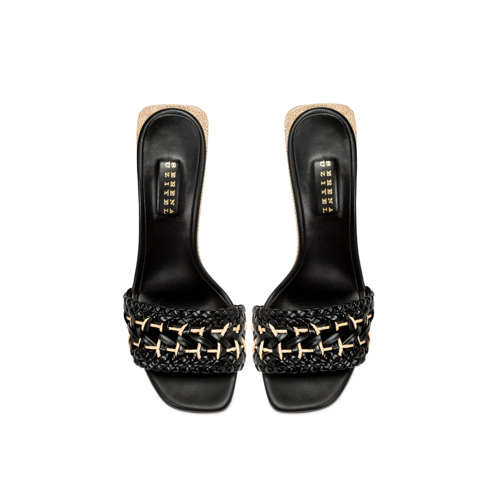 Almeria Black Wedge Sandal featuring a stylish woven strap design and sleek black finish.