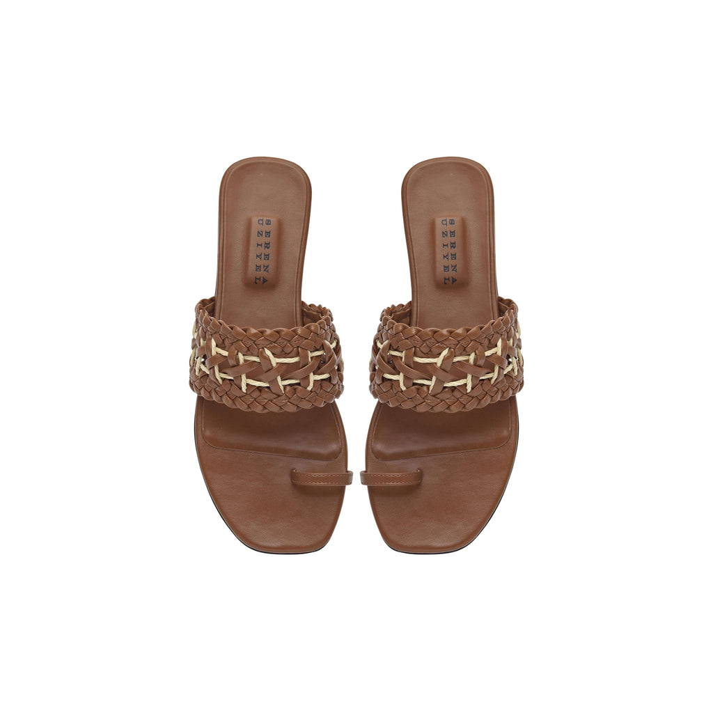 Almeria Camello Flat Toe Sandal in leather and raffia, featuring a stylish woven design in natural tones.