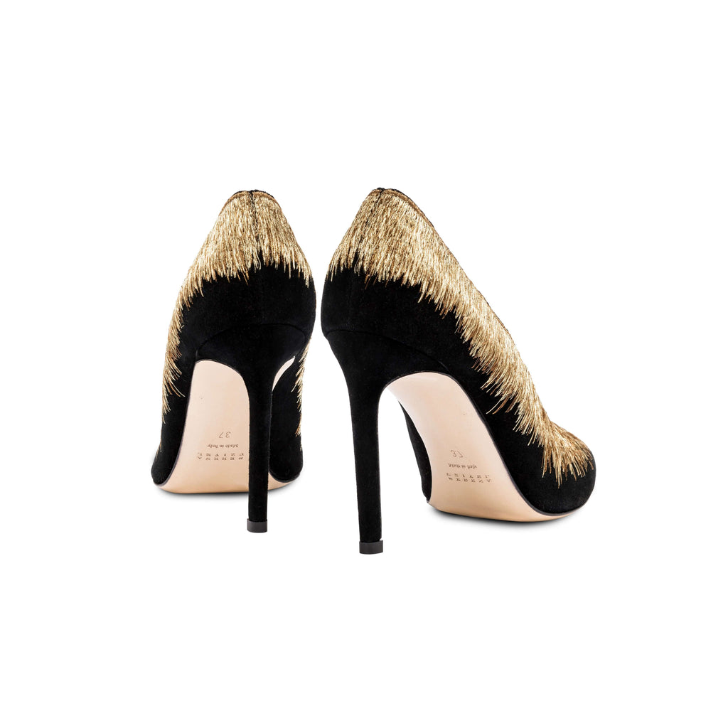Elegant Arinna Black High-Heel Pumps with golden embellishments, crafted from suede, showcasing a chic pointed toe.