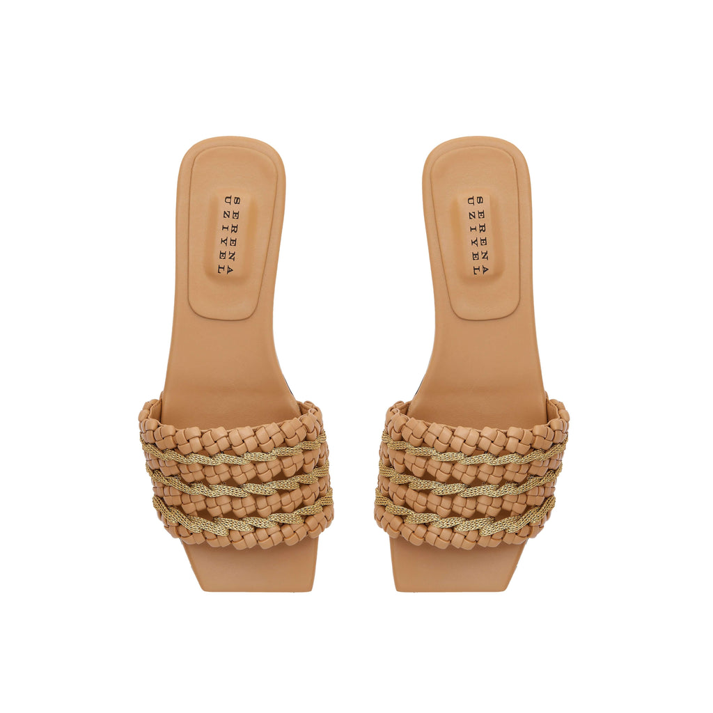 Aurnia Latte Flat Sandal featuring stylish woven straps and a comfortable flat sole, perfect for casual summer outings.