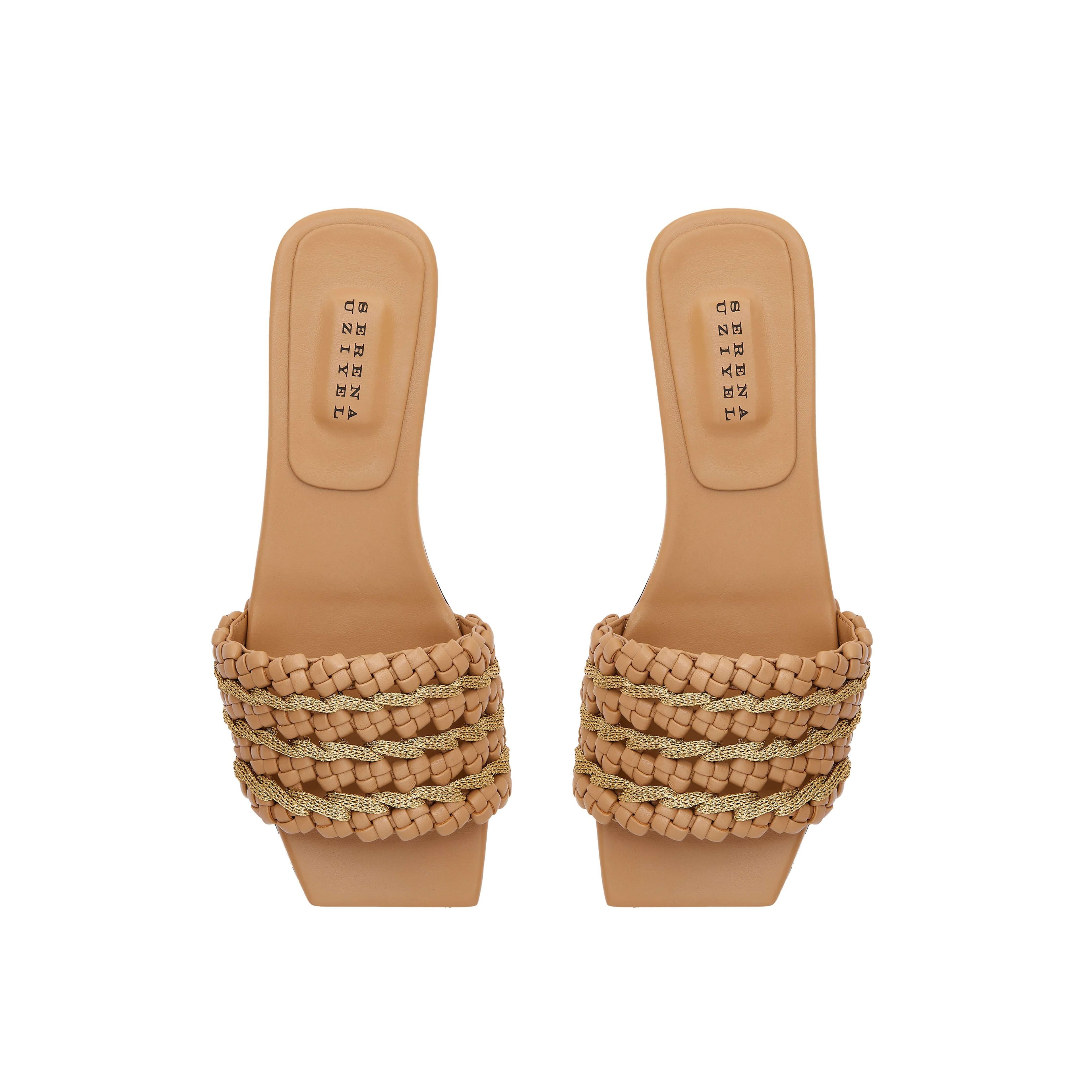 Aurnia Latte Flat Sandal featuring stylish woven straps and a comfortable flat sole, perfect for casual summer outings.