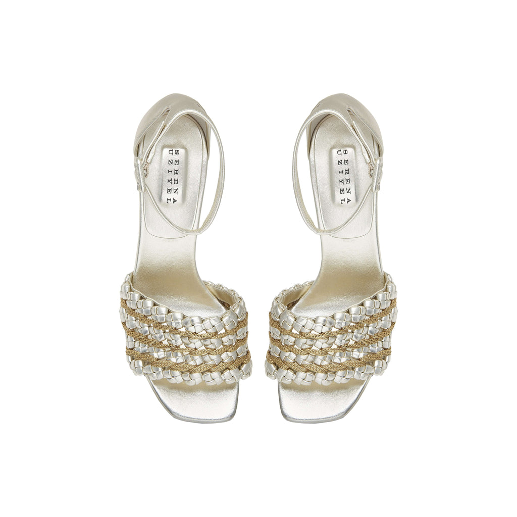 Elegant silver high-heeled sandals with unique braided design and ankle strap, perfect for formal occasions.