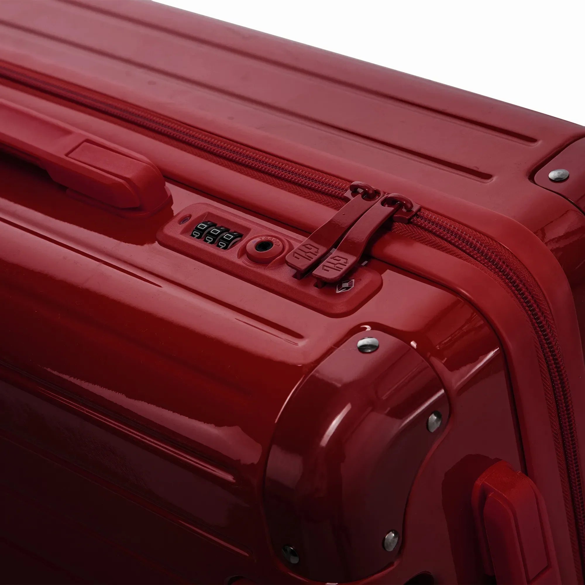 Fermeture à combinaison TSA et double curseur zippé GYL sur la valise rigide rouge foncé Intemporelle. #couleur_rouge foncé