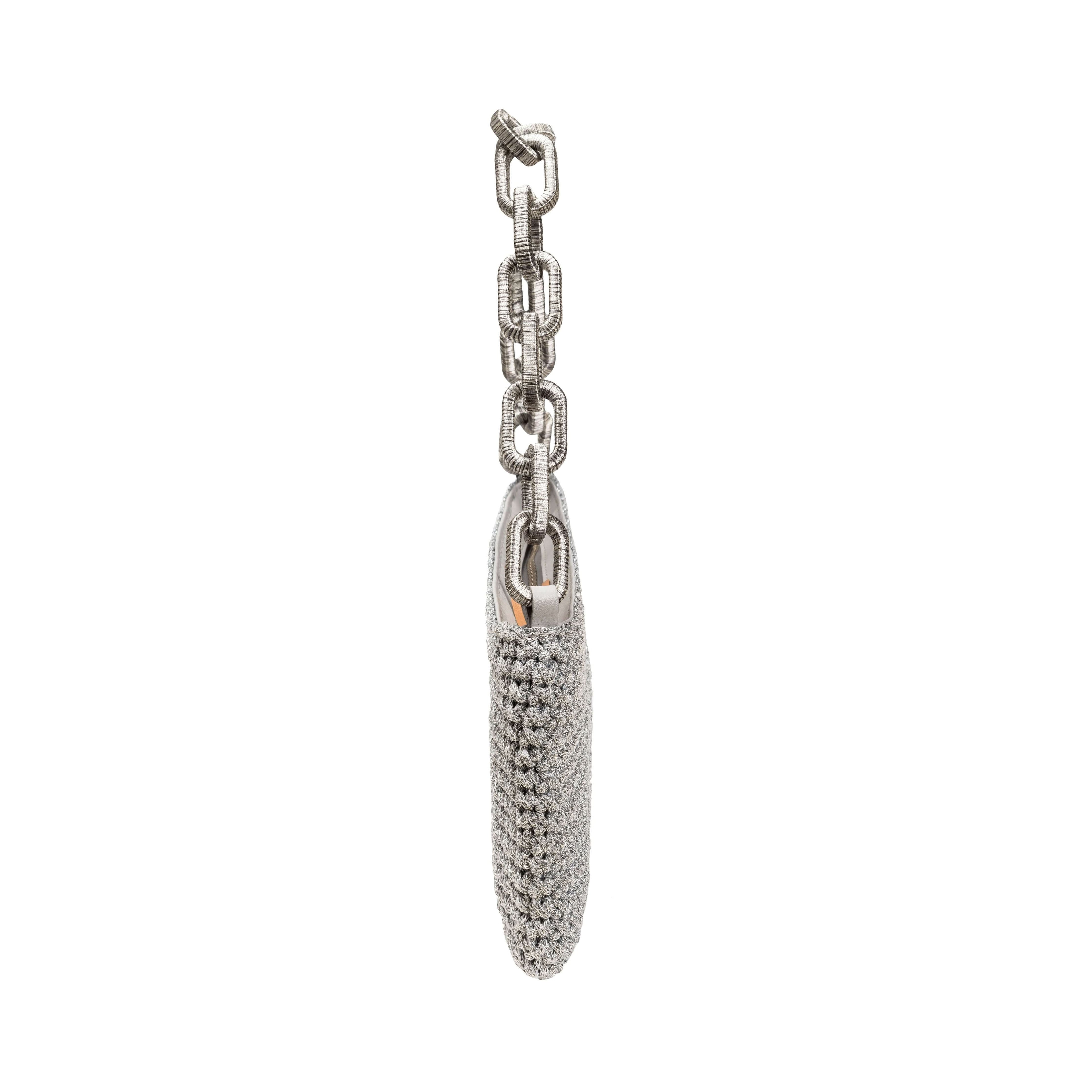 Catena Antique Silver Clutch with chain handle, showcasing elegant design and vintage charm.