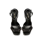 Stylish Catena Black Platform Ankle Sandals featuring open toe and ankle-strap, adorned with signature chain embellishments.