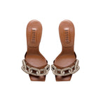 Catena Camello High-Heel Sandal featuring a glam chain and 90mm heel, crafted from luxurious leather.
