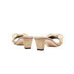 Back view of Catena Natural Mid-Heel Sandal in fine linen with raffia chain link design, perfect for elegant styling.